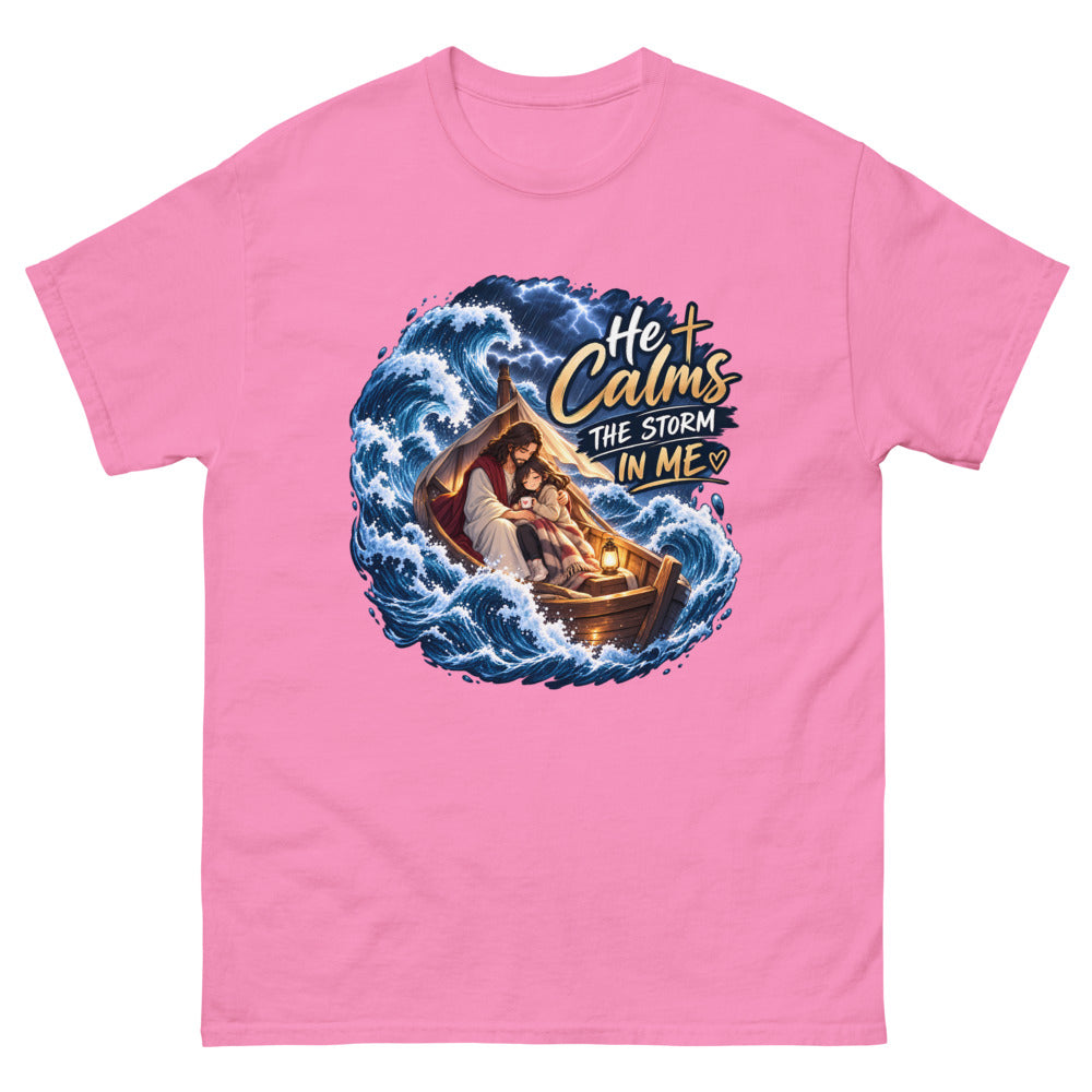 Jesus holding a young woman in a boat during a storm with the words He Calms The Storm In Me on a Azalea shirt