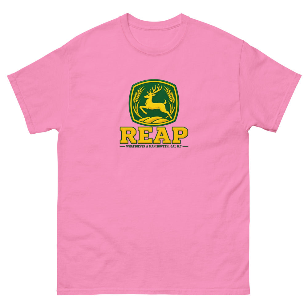 Green and gold crest with a leaping deer and wheat reading Reap, Galatians 6:7 on a Azalea shirt