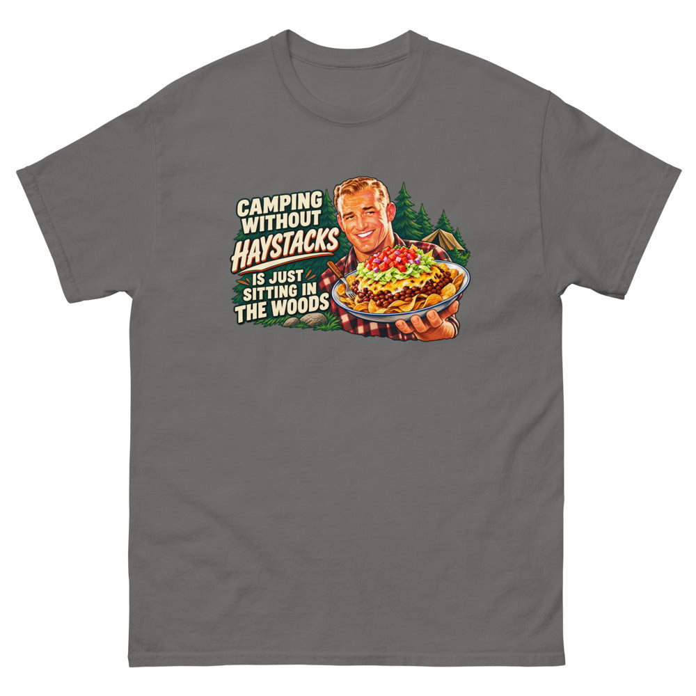 Retro illustration of a camper holding a plate of haystacks with the words Camping Without Haystacks Is Just Sitting In The Woods on a Charcoal shirt