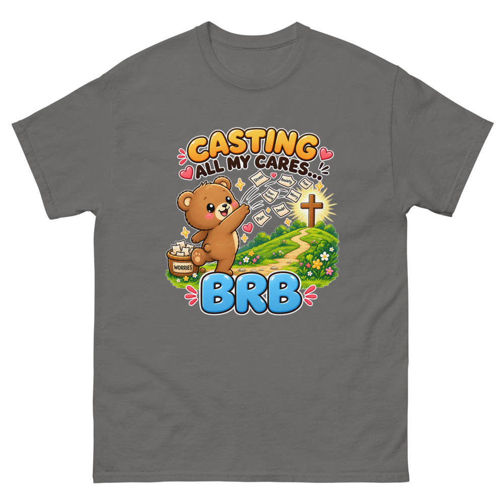 Cartoon bear throwing worry notes away with the words Casting All My Cares BRB on a Charcoal shirt