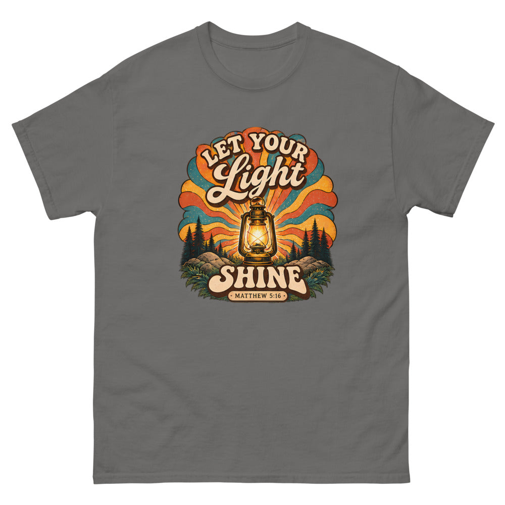 Retro lantern glowing against sunburst rays reading Let Your Light Shine on a Charcoal shirt