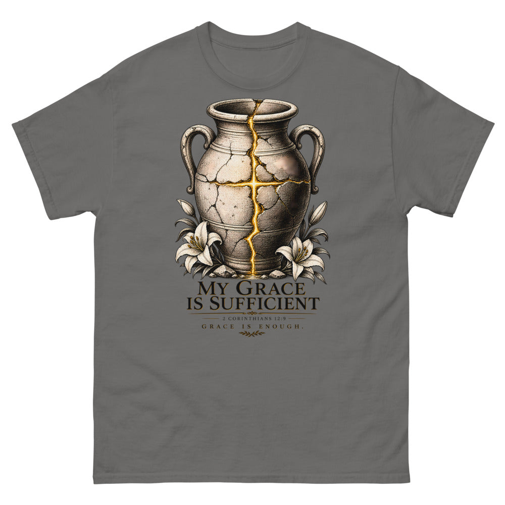 Cracked vessel repaired with gold seams forming a cross, reading My Grace Is Sufficient on a Charcoal shirt