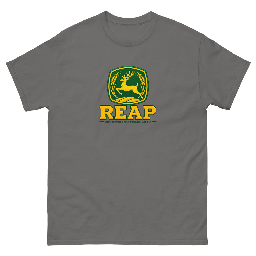 Green and gold crest with a leaping deer and wheat reading Reap, Galatians 6:7 on a Charcoal shirt
