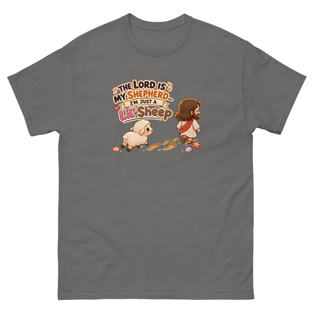 Chibi Jesus walking ahead of a little sheep with the words The Lord Is My Shepherd I'm Just A Lil Sheep on a Charcoal shirt