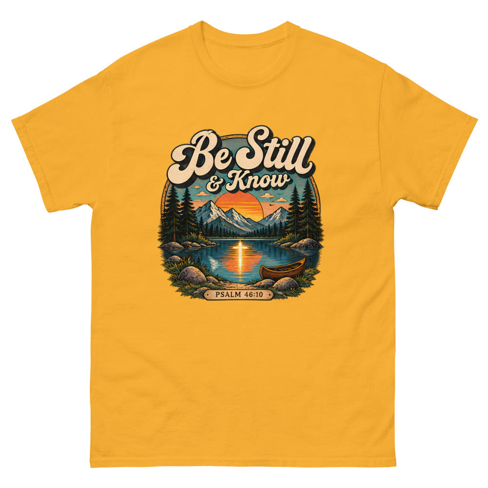 Retro lake and canoe scene at sunset reading Be Still And Know on a Gold shirt