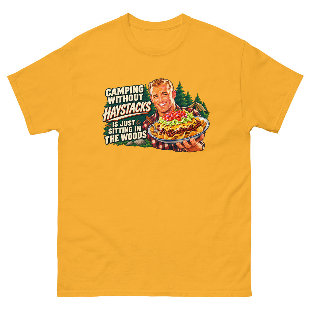 Retro illustration of a camper holding a plate of haystacks with the words Camping Without Haystacks Is Just Sitting In The Woods on a Gold shirt