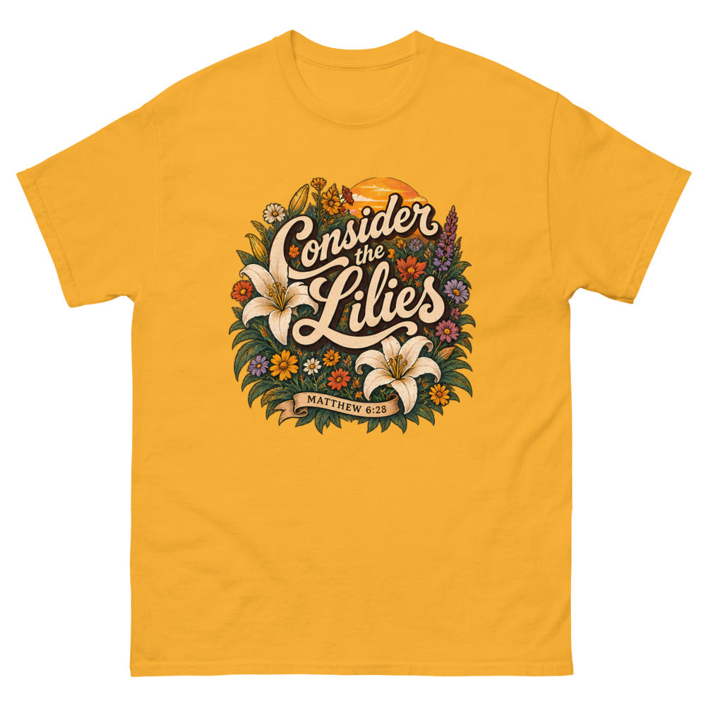 Retro floral illustration with lilies reading Consider The Lilies on a Gold shirt