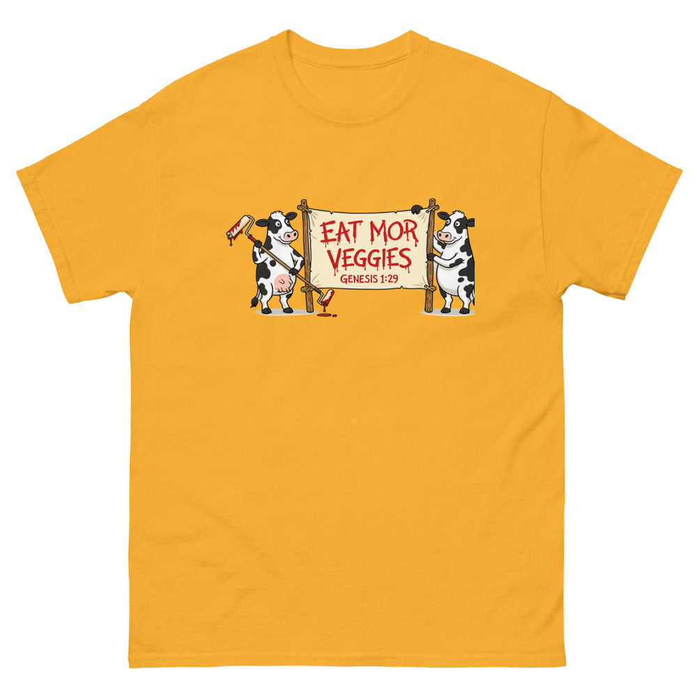 Two cartoon cows holding a banner reading Eat Mor Veggies, Genesis 1:29 on a Gold shirt