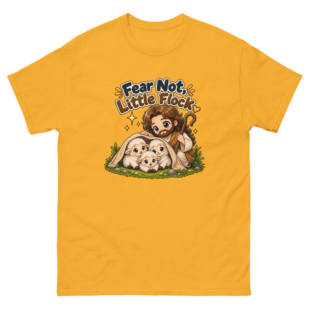 Chibi Jesus tucking a blanket around three sheep with the words Fear Not Little Flock on a Gold shirt