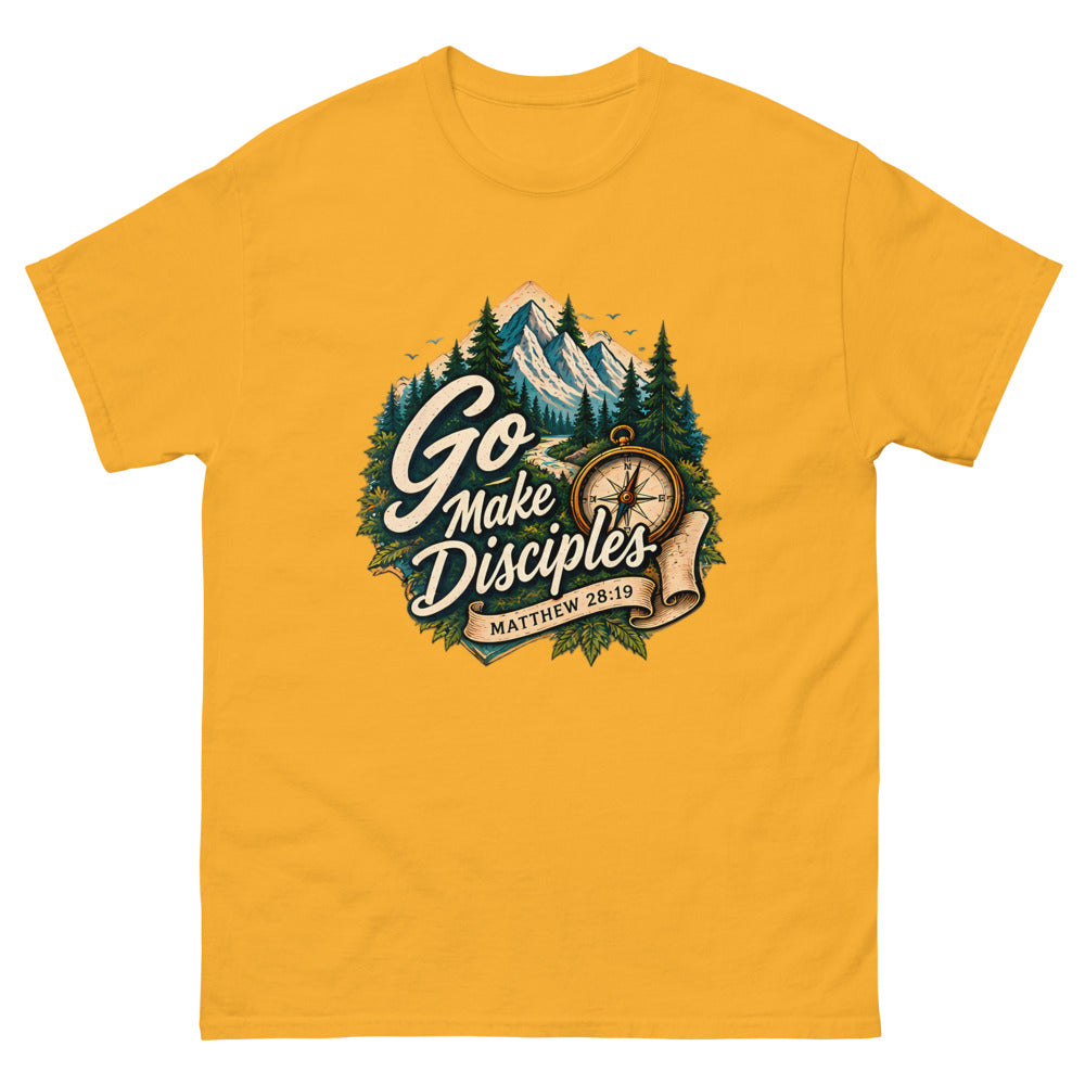 Compass over a mountain trail badge reading Go Make Disciples on a Gold shirt