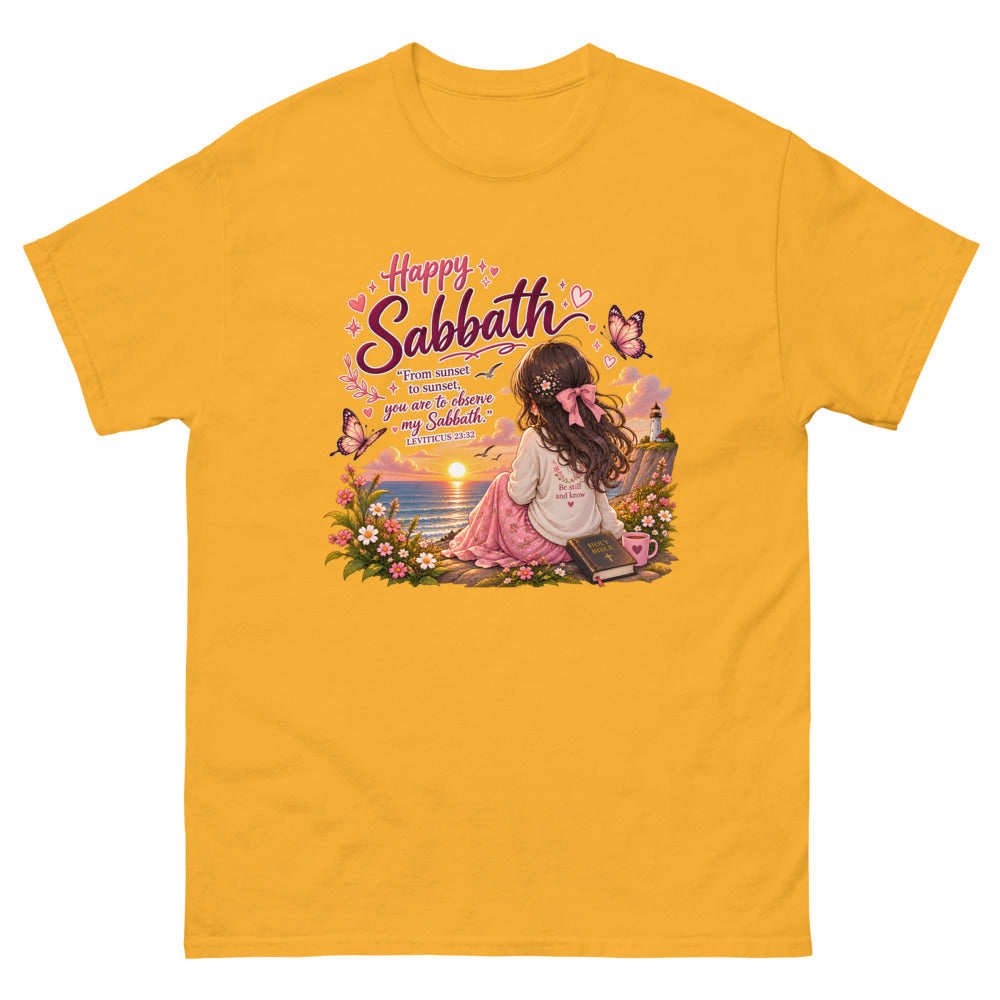 Chibi girl watching an ocean sunset with a Bible and the words Happy Sabbath on a Gold shirt