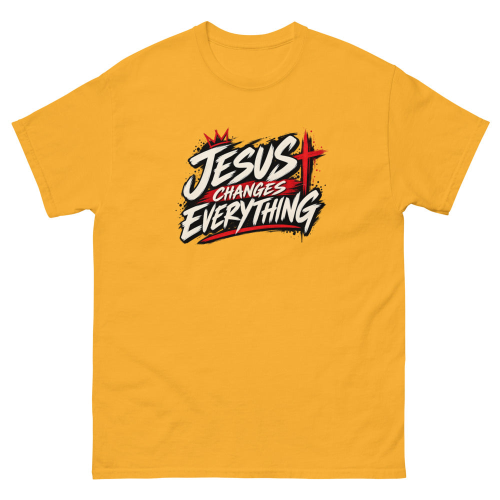 Brush script streetwear graphic with a crown and red cross reading Jesus Changes Everything on a Gold shirt