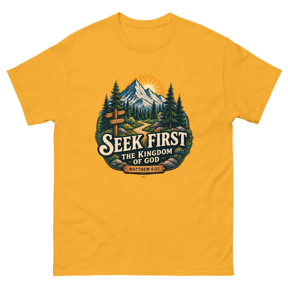 Vintage trail badge with mountains and a signpost reading Seek First The Kingdom Of God on a Gold shirt