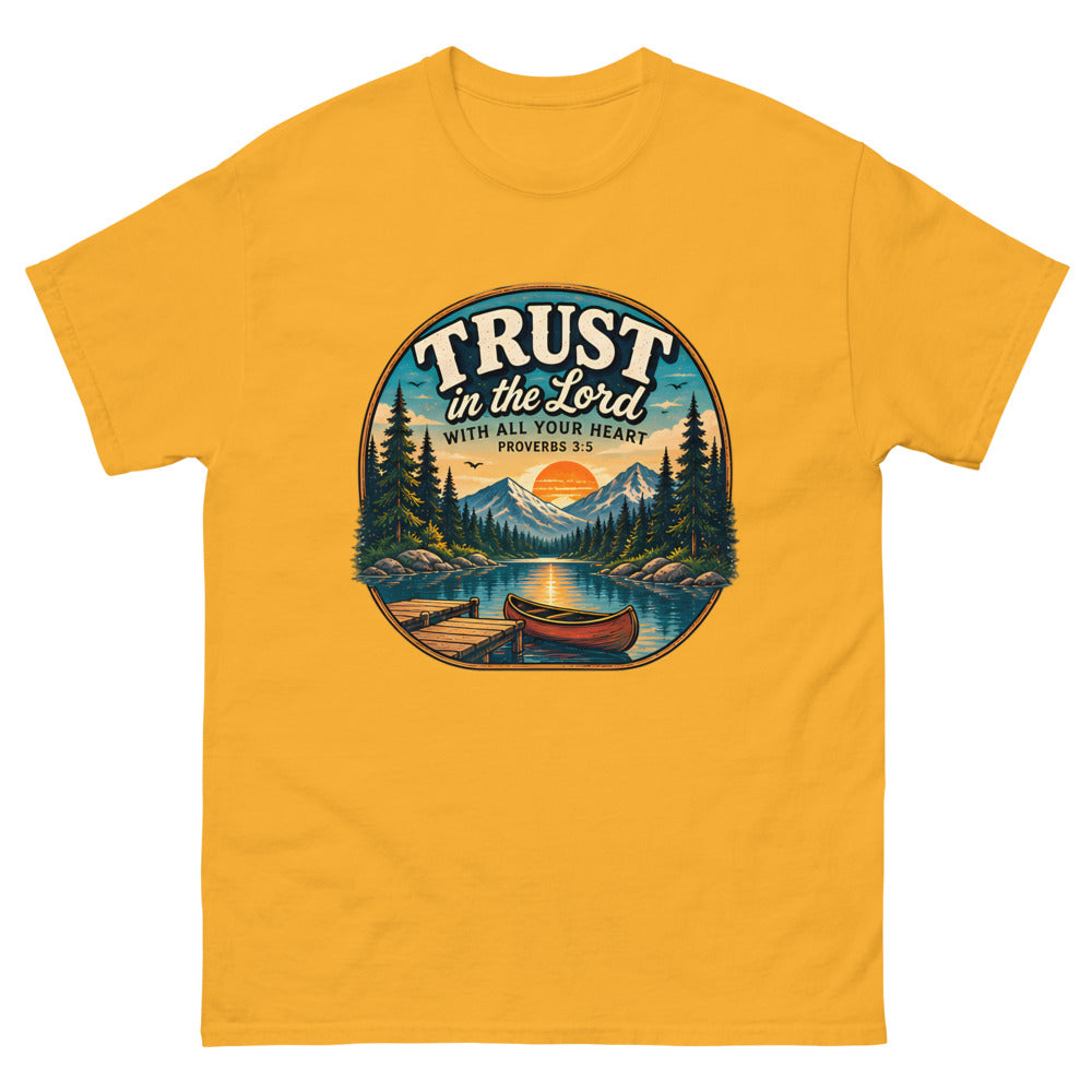 Round lakeside badge with a canoe and dock reading Trust In The Lord With All Your Heart on a Gold shirt