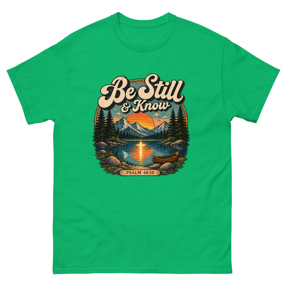 Retro lake and canoe scene at sunset reading Be Still And Know on a Irish Green shirt