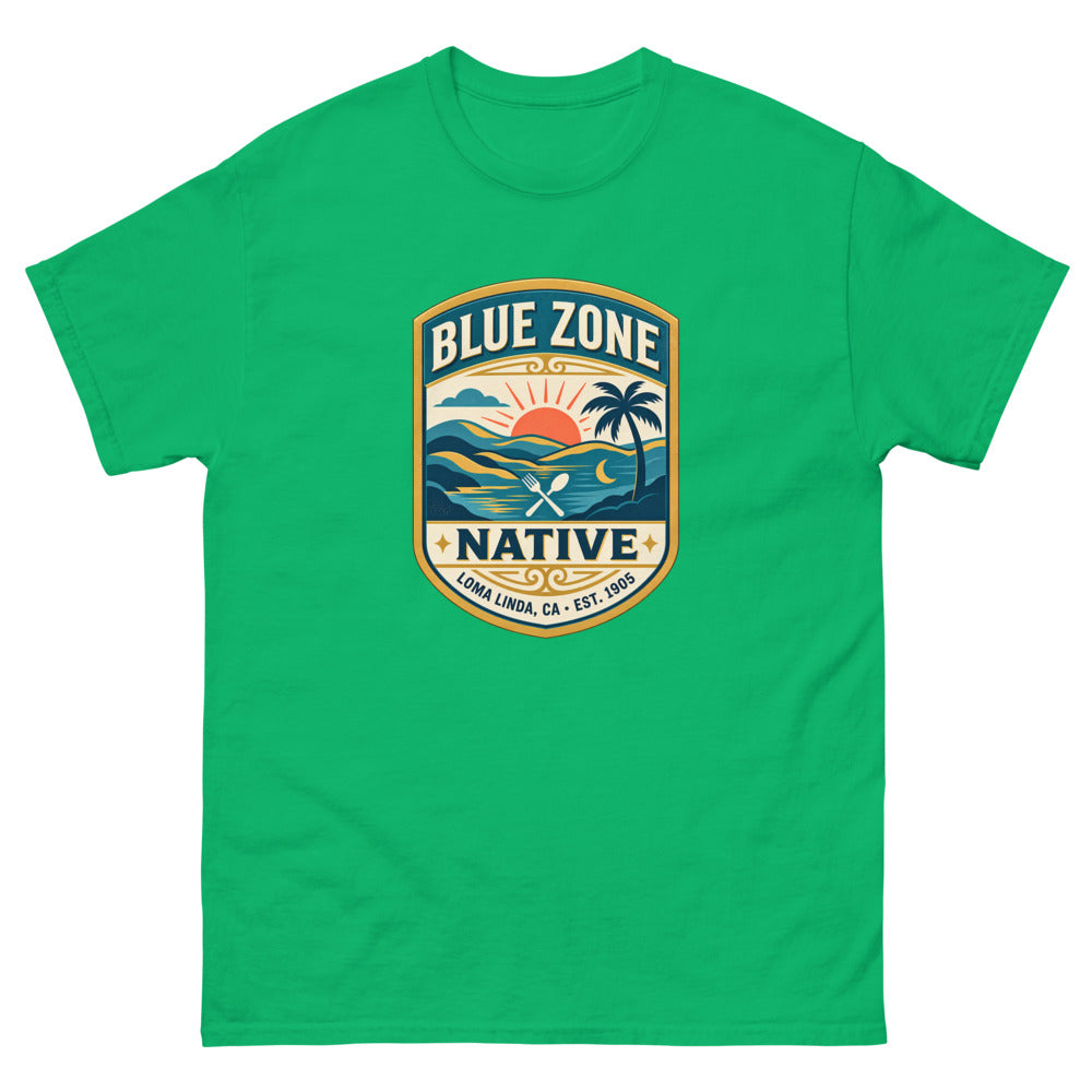 Vintage badge with a sunset and palm tree reading Blue Zone Native, Loma Linda CA on a Irish Green shirt