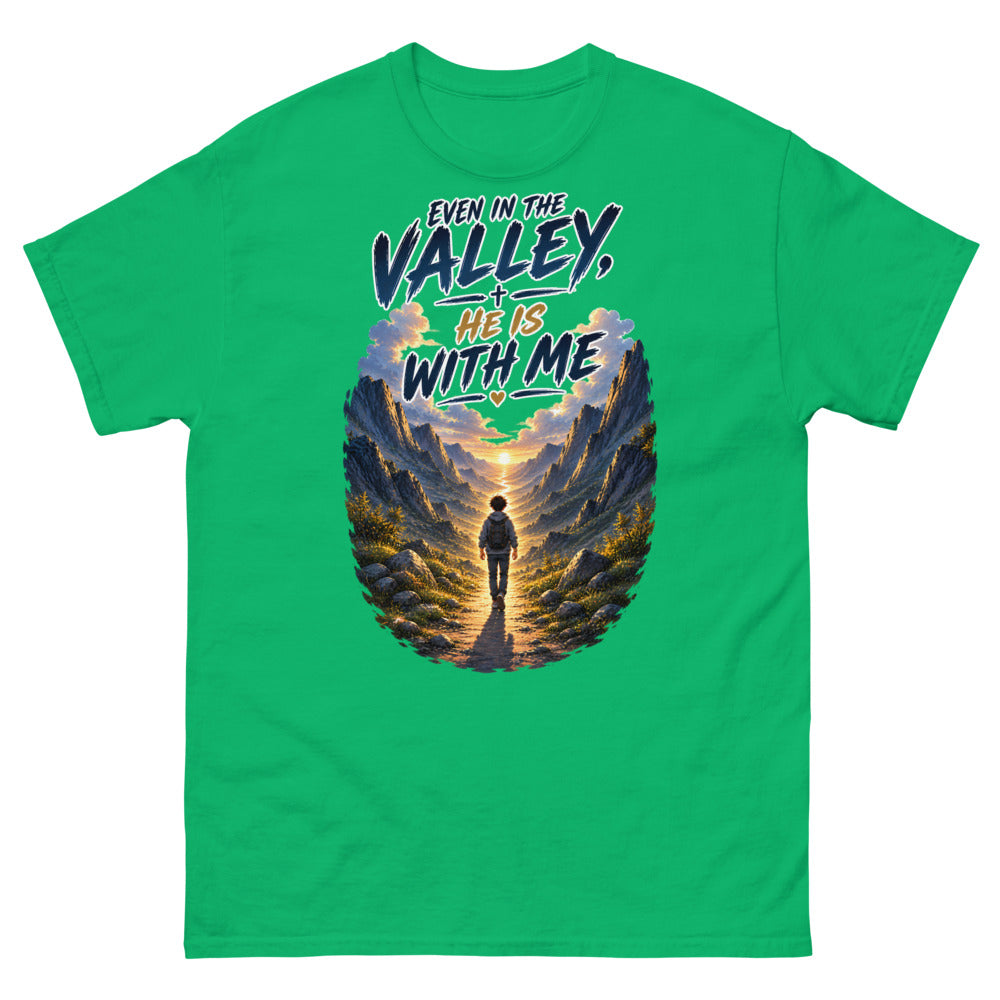 Hiker walking through a mountain valley with the words Even In The Valley He Is With Me on a Irish Green shirt