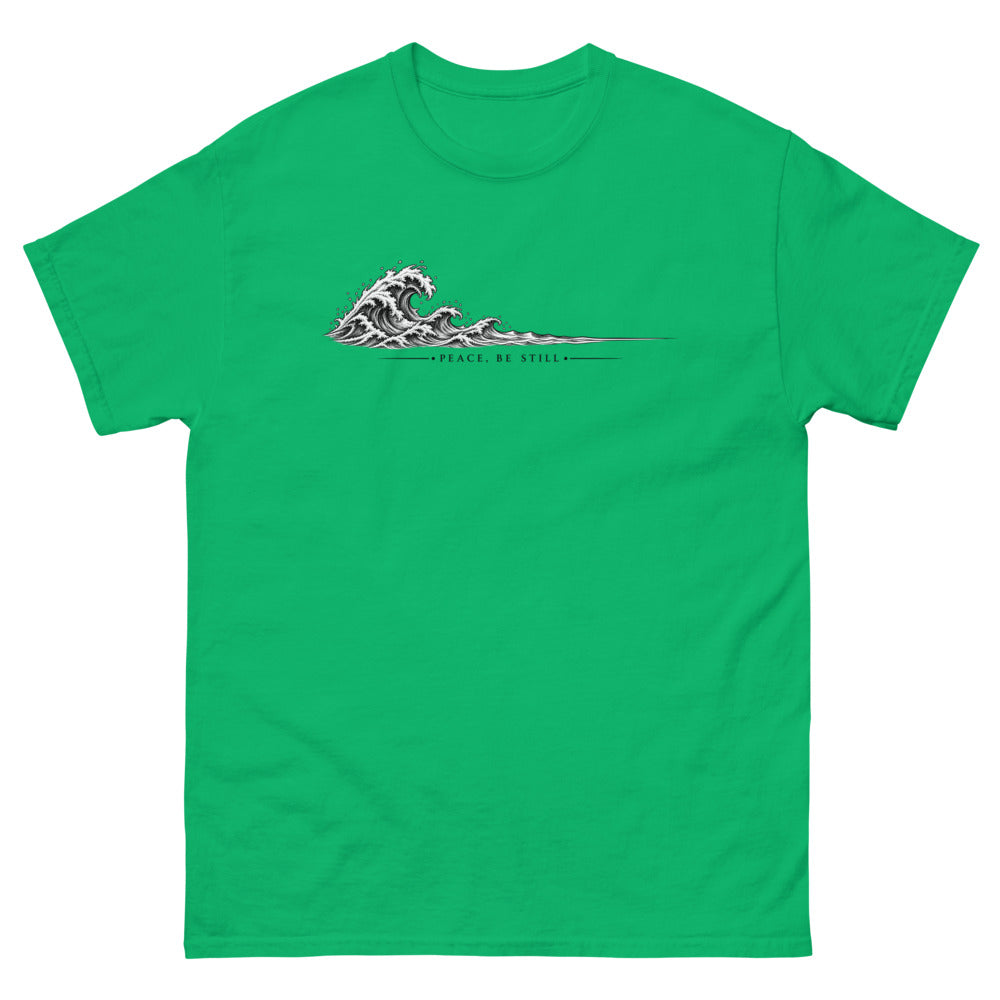 Engraved line art wave with the words Peace Be Still on a Irish Green shirt