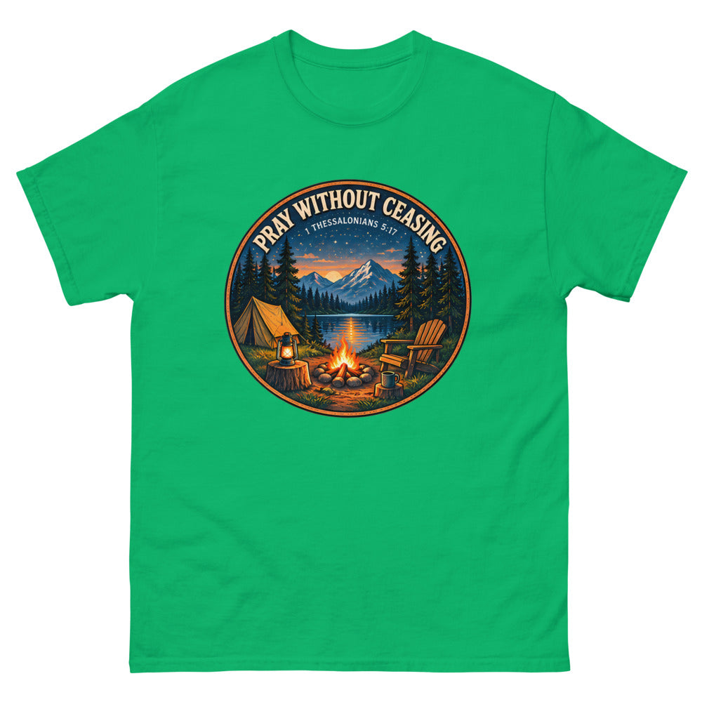 Round campfire and tent badge at night reading Pray Without Ceasing on a Irish Green shirt