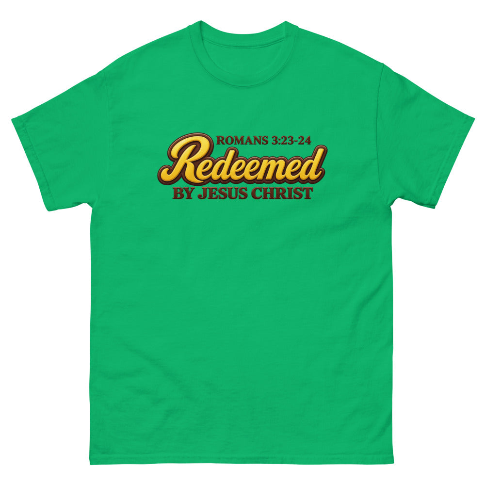 Glossy gold and brown candy script reading Redeemed by Jesus Christ, Romans 3:23-24 on a Irish Green shirt