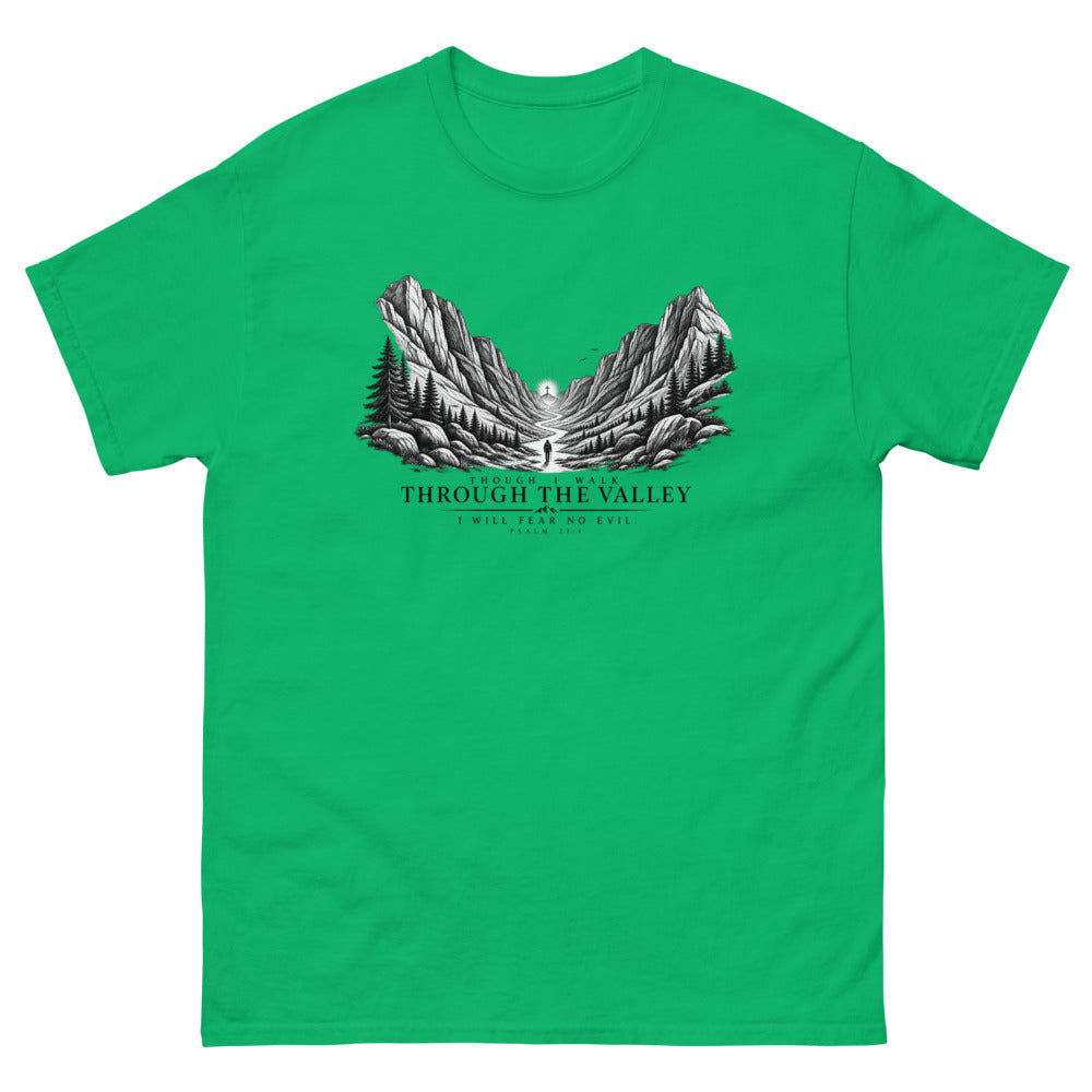 Engraved mountain valley with a lone figure reading Though I Walk Through The Valley I Will Fear No Evil on a Irish Green shirt