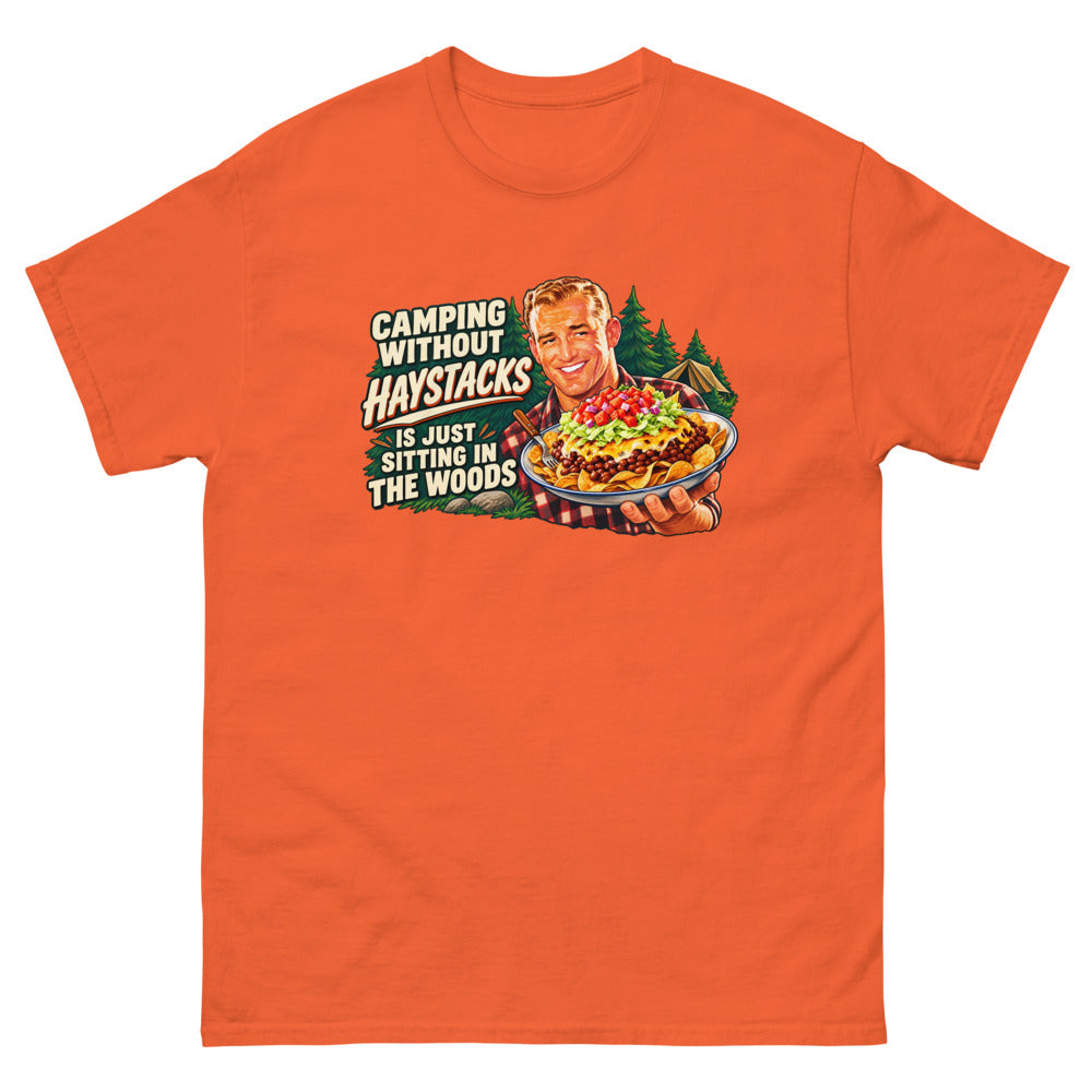 Retro illustration of a camper holding a plate of haystacks with the words Camping Without Haystacks Is Just Sitting In The Woods on a Orange shirt