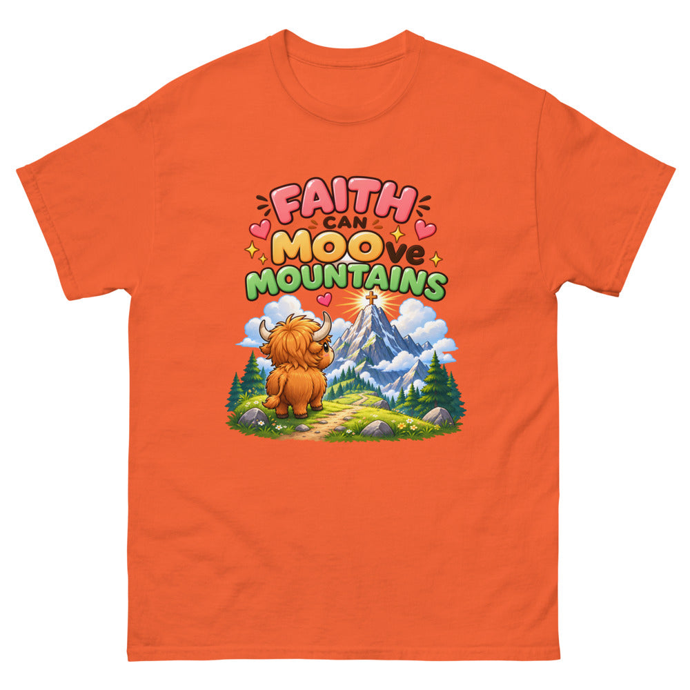 Cartoon highland cow looking at a mountain with the words Faith Can Moo-ve Mountains on a Orange shirt