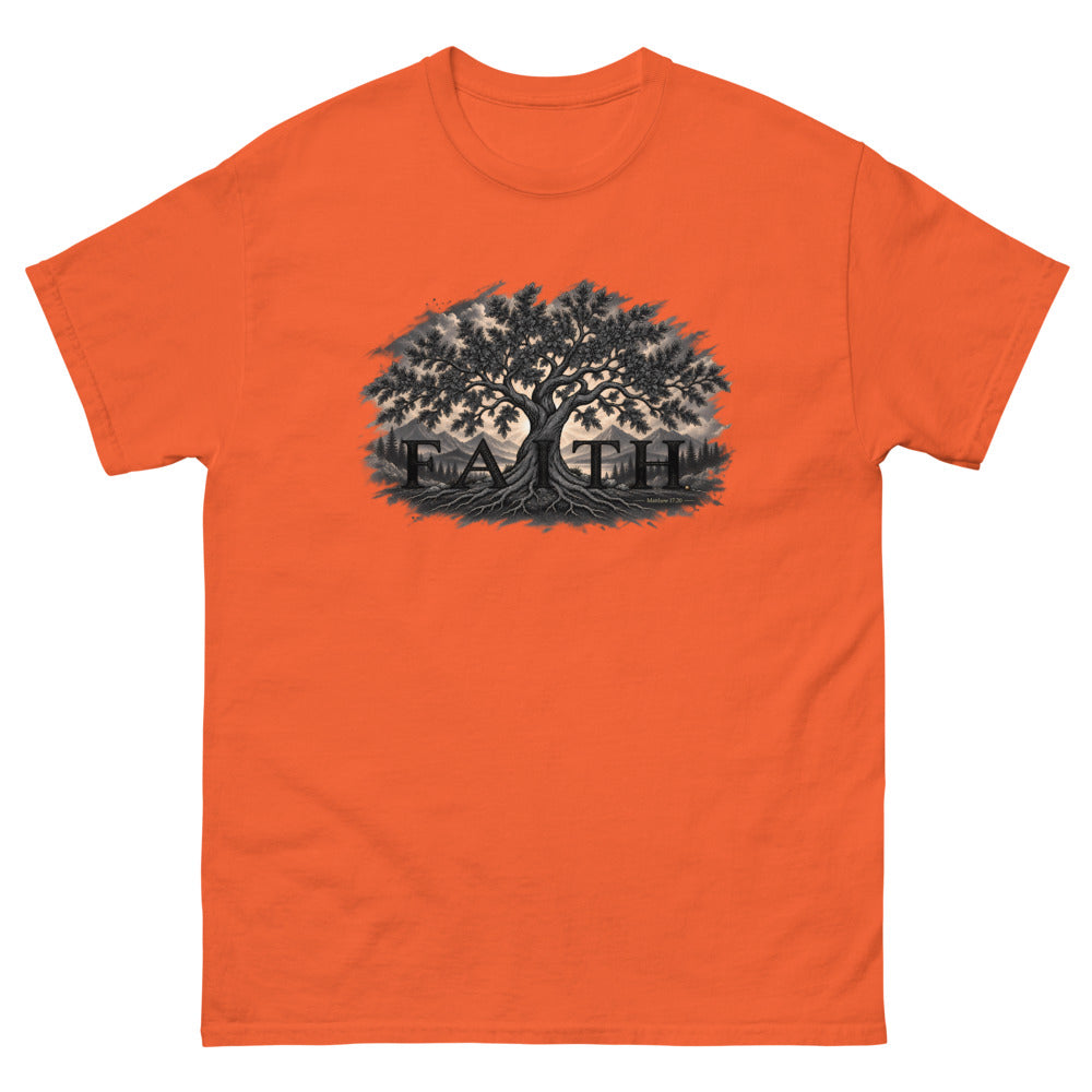 Engraved tree growing through the word Faith with Matthew 17:20 on a Orange shirt