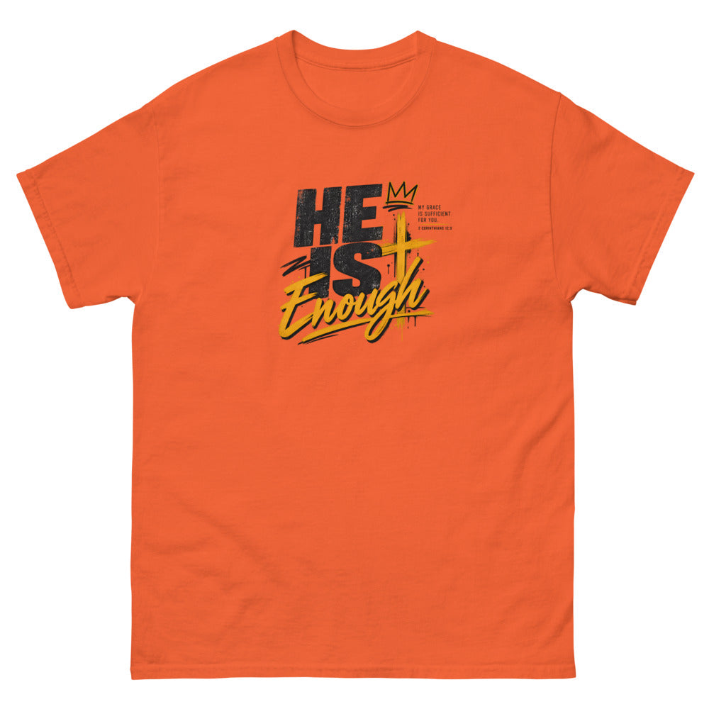 Graffiti style lettering with a crown and gold cross reading He Is Enough on a Orange shirt