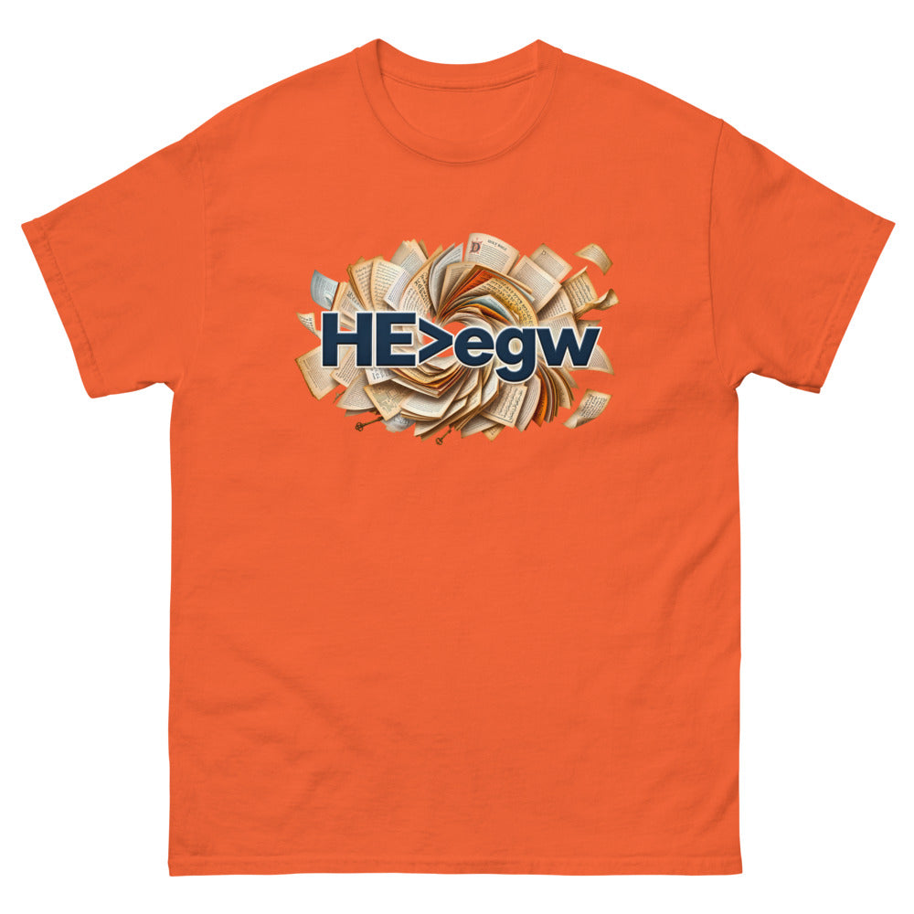 Spiral of open Bibles with navy lettering reading HE is greater than egw on a Orange shirt