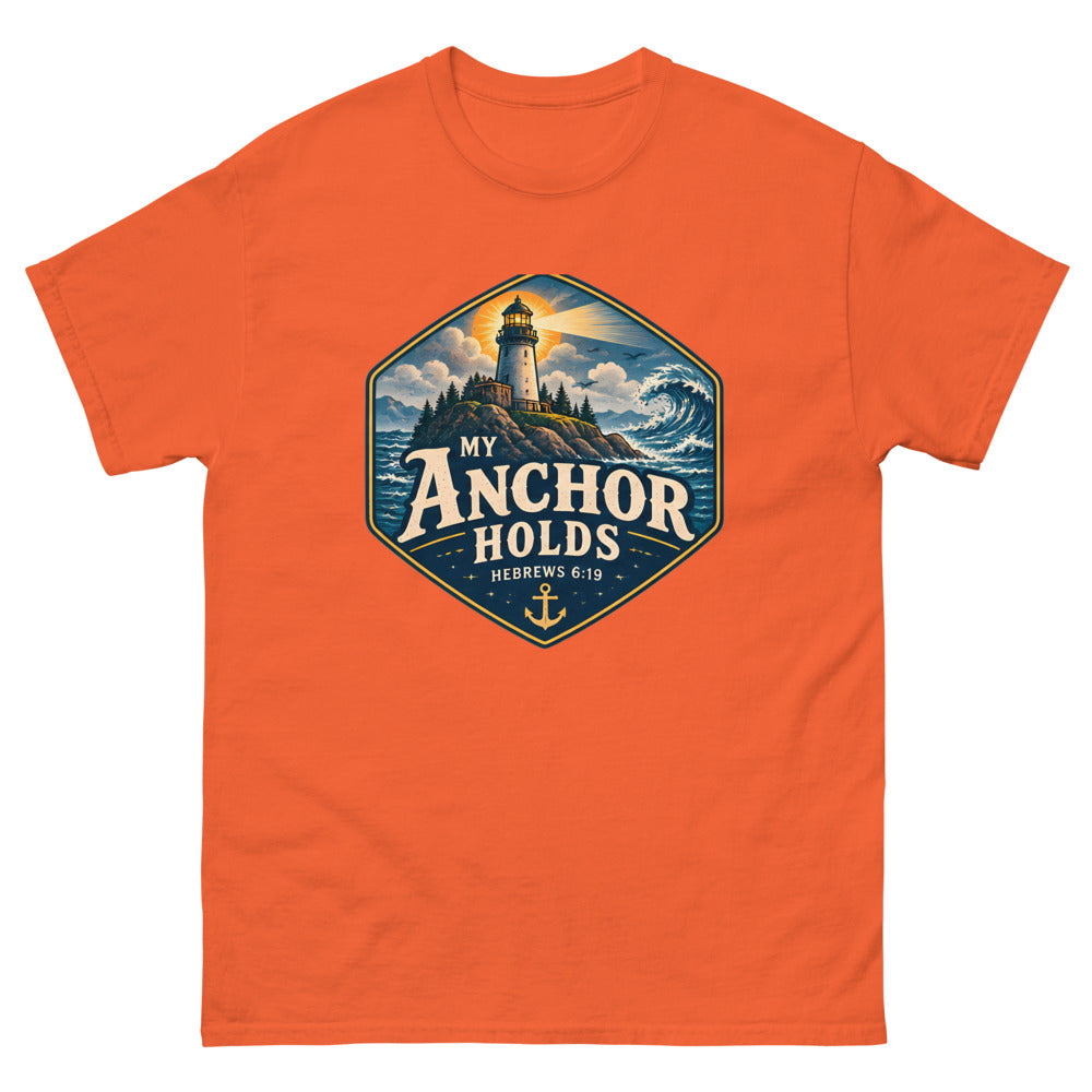 Navy hexagon badge with a lighthouse and wave reading My Anchor Holds on a Orange shirt