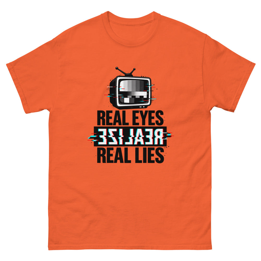 Glitching retro television with the words Real Eyes Realize Real Lies on a Orange shirt