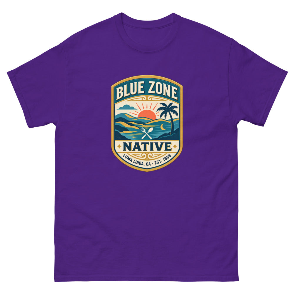 Vintage badge with a sunset and palm tree reading Blue Zone Native, Loma Linda CA on a Purple shirt