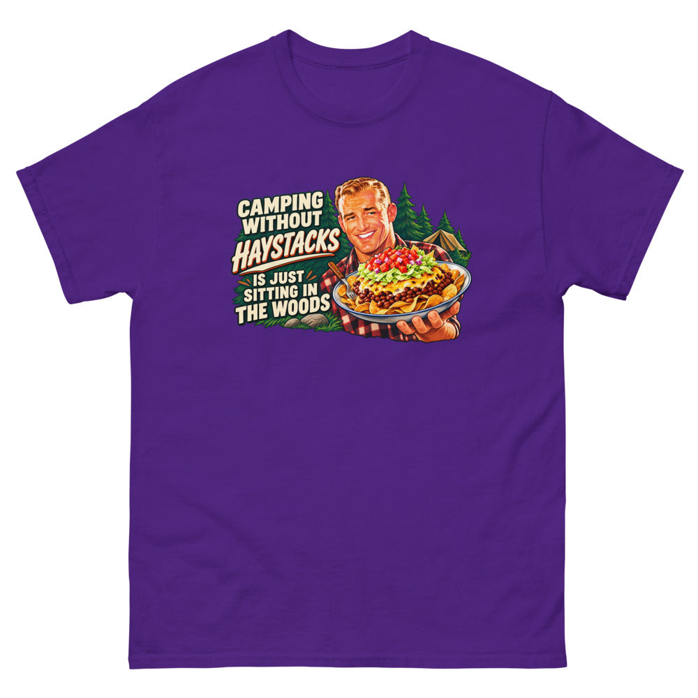 Retro illustration of a camper holding a plate of haystacks with the words Camping Without Haystacks Is Just Sitting In The Woods on a Purple shirt