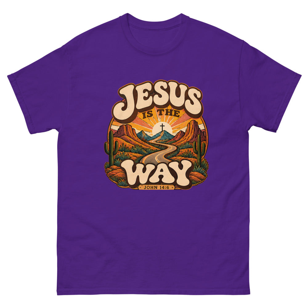 Retro groovy desert badge with a winding road to a cross reading Jesus Is The Way on a Purple shirt