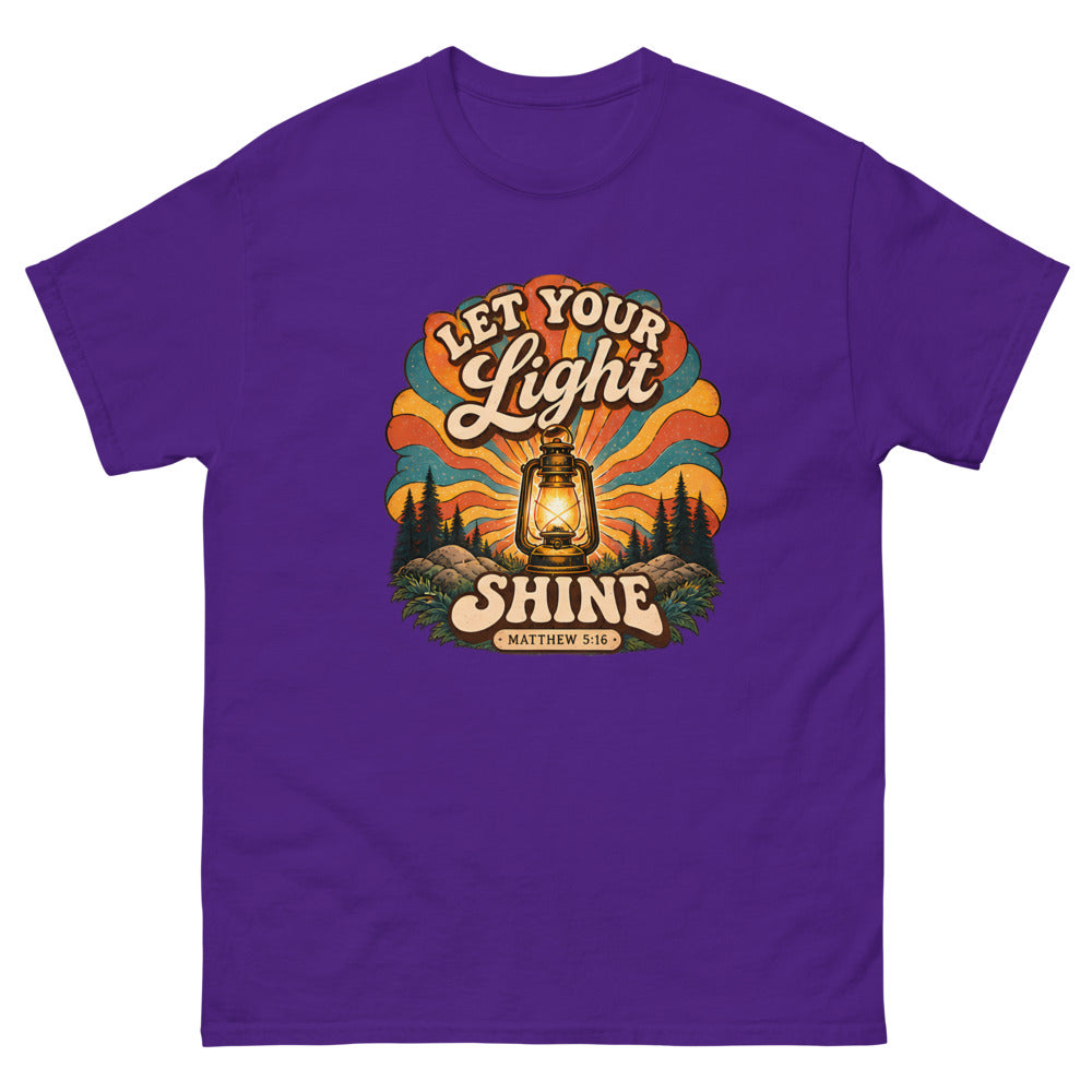 Retro lantern glowing against sunburst rays reading Let Your Light Shine on a Purple shirt