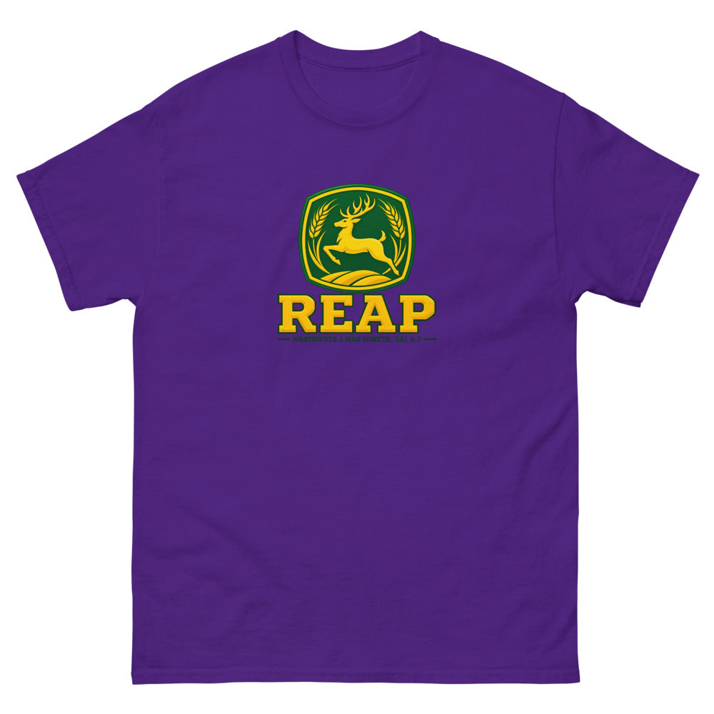 Green and gold crest with a leaping deer and wheat reading Reap, Galatians 6:7 on a Purple shirt