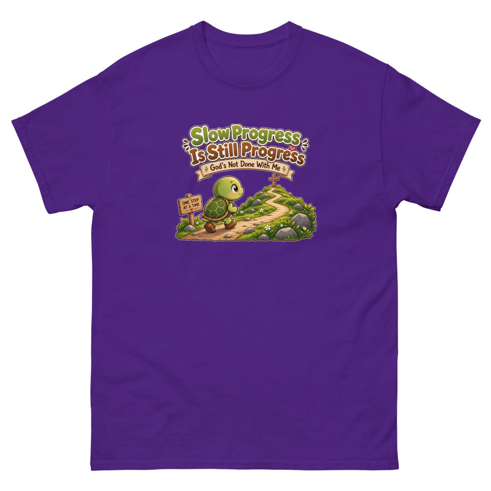 Cartoon turtle walking a path toward a cross with the words Slow Progress Is Still Progress on a Purple shirt