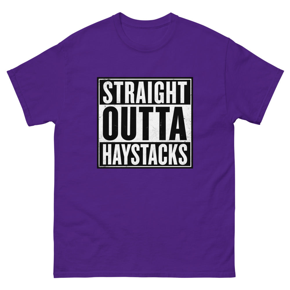 Distressed block lettering reading Straight Outta Haystacks on a Purple shirt