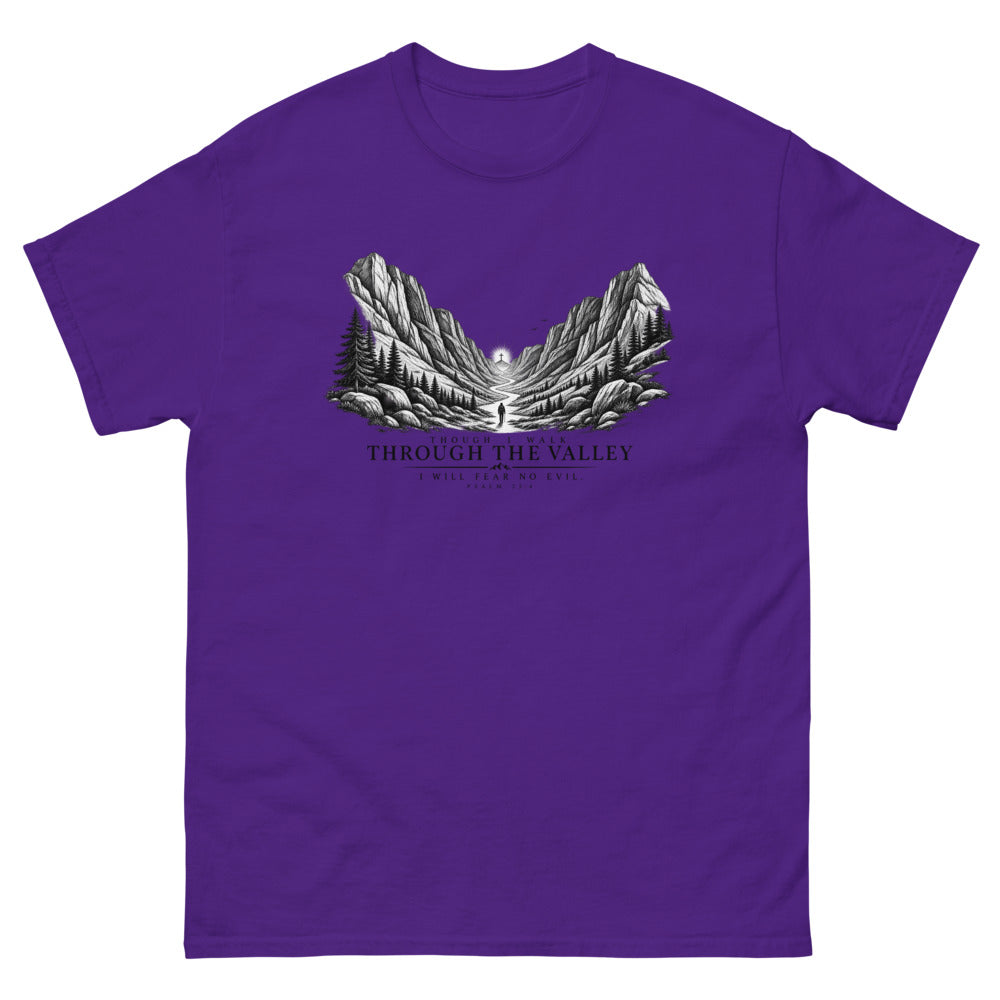 Engraved mountain valley with a lone figure reading Though I Walk Through The Valley I Will Fear No Evil on a Purple shirt