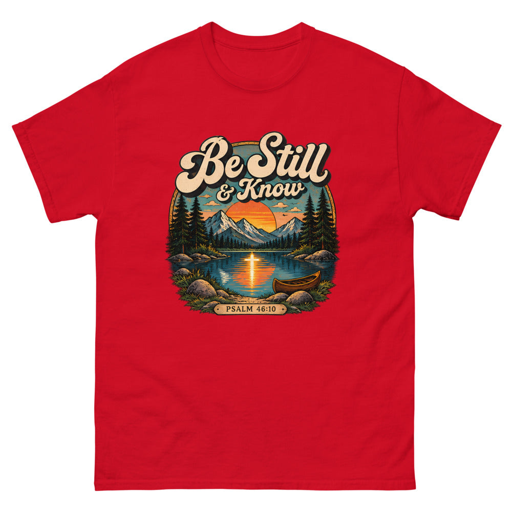 Retro lake and canoe scene at sunset reading Be Still And Know on a Red shirt