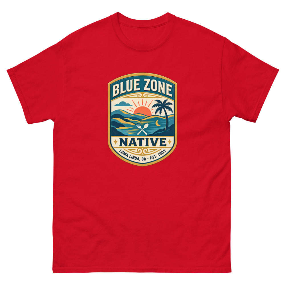 Vintage badge with a sunset and palm tree reading Blue Zone Native, Loma Linda CA on a Red shirt