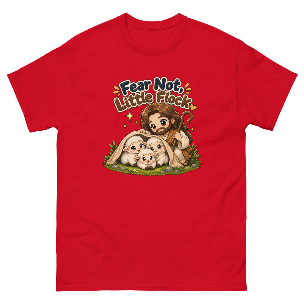 Chibi Jesus tucking a blanket around three sheep with the words Fear Not Little Flock on a Red shirt