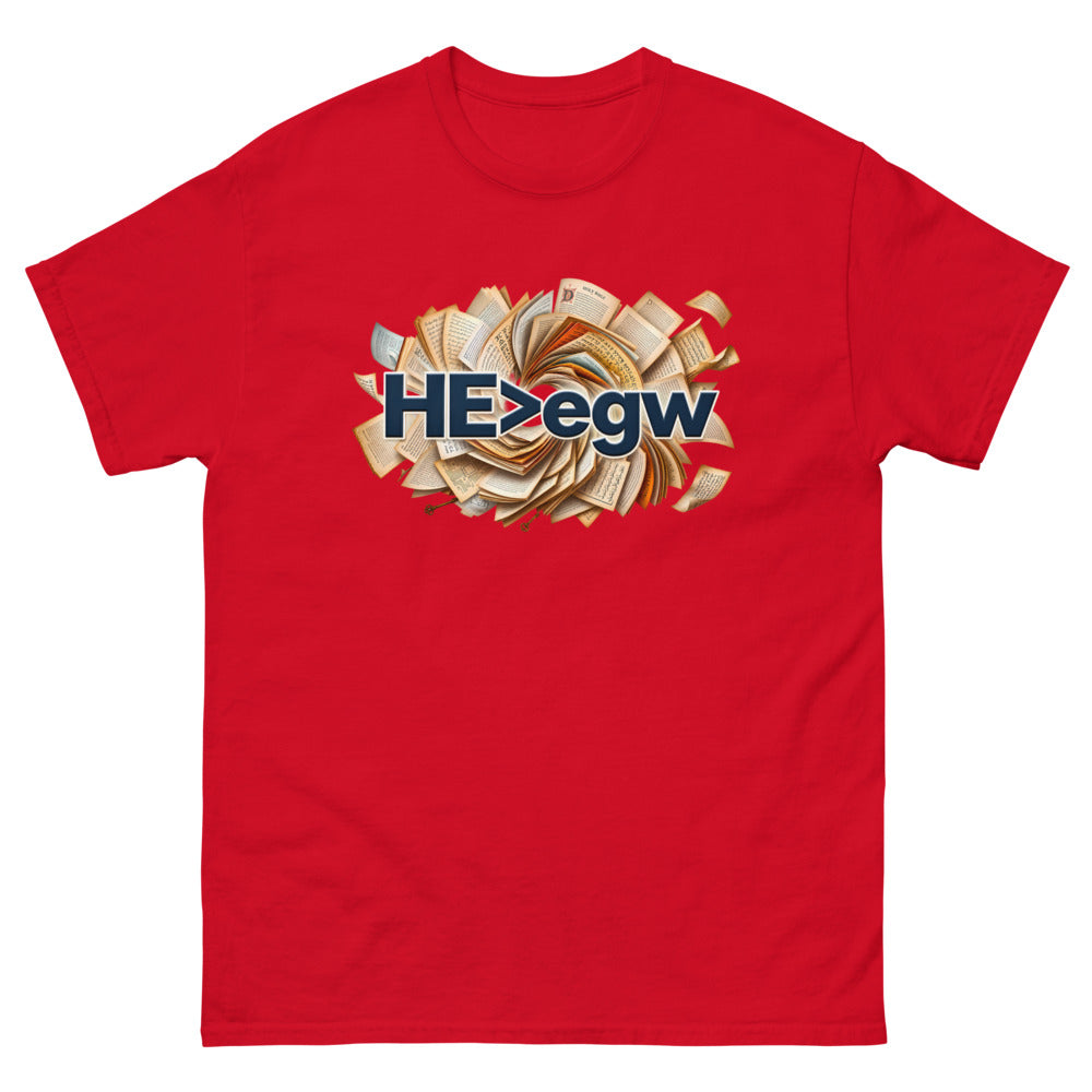 Spiral of open Bibles with navy lettering reading HE is greater than egw on a Red shirt