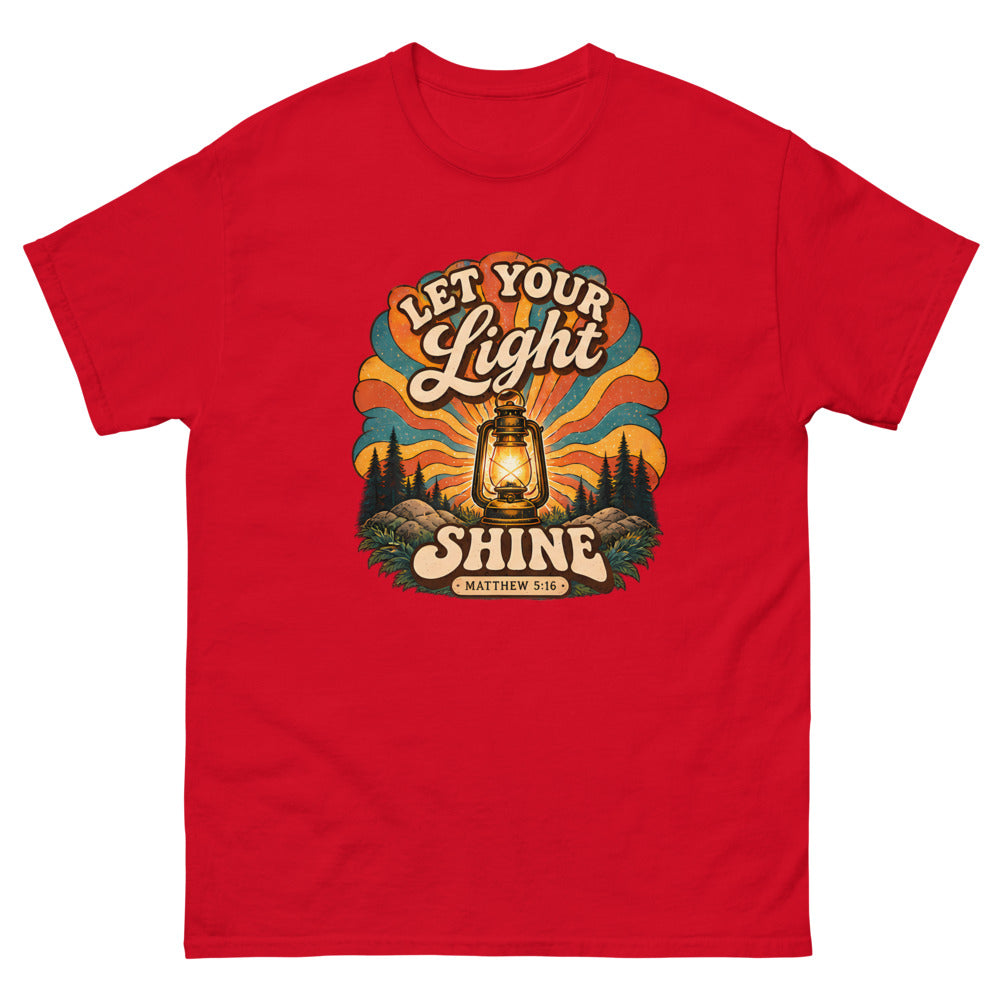 Retro lantern glowing against sunburst rays reading Let Your Light Shine on a Red shirt