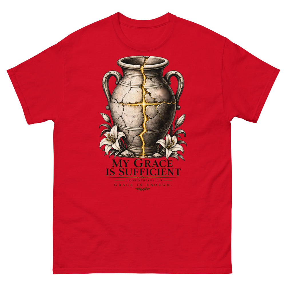 Cracked vessel repaired with gold seams forming a cross, reading My Grace Is Sufficient on a Red shirt