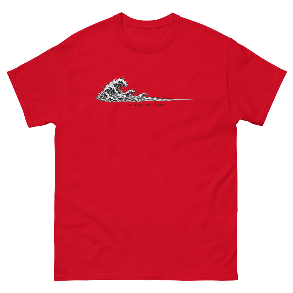 Engraved line art wave with the words Peace Be Still on a Red shirt