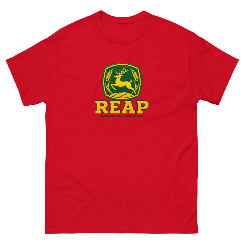 Green and gold crest with a leaping deer and wheat reading Reap, Galatians 6:7 on a Red shirt