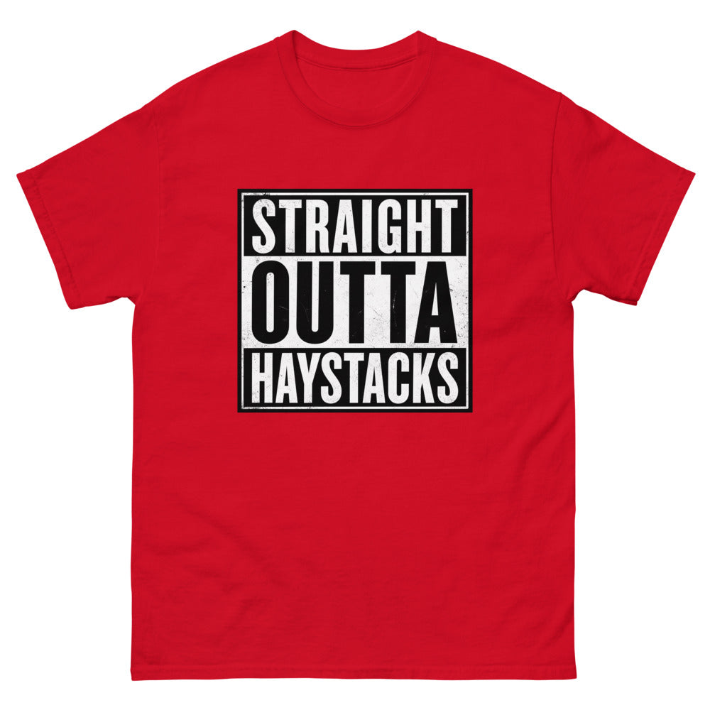 Distressed block lettering reading Straight Outta Haystacks on a Red shirt