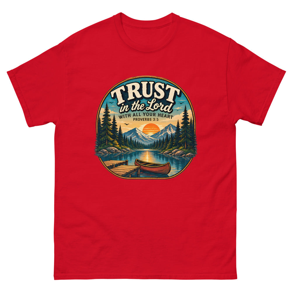 Round lakeside badge with a canoe and dock reading Trust In The Lord With All Your Heart on a Red shirt